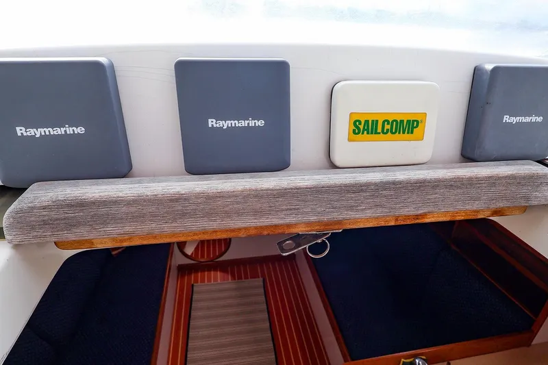 Slide: The Image of 1999 J Boats J/32 cockpit with Raymarine and Sailcomp navigation instruments. - 12