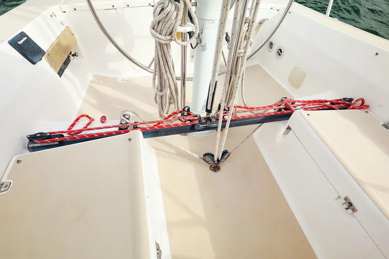 Slide: The Image of 1999 J Boats J/32 sailboat cockpit with ropes and steering wheel. - 15