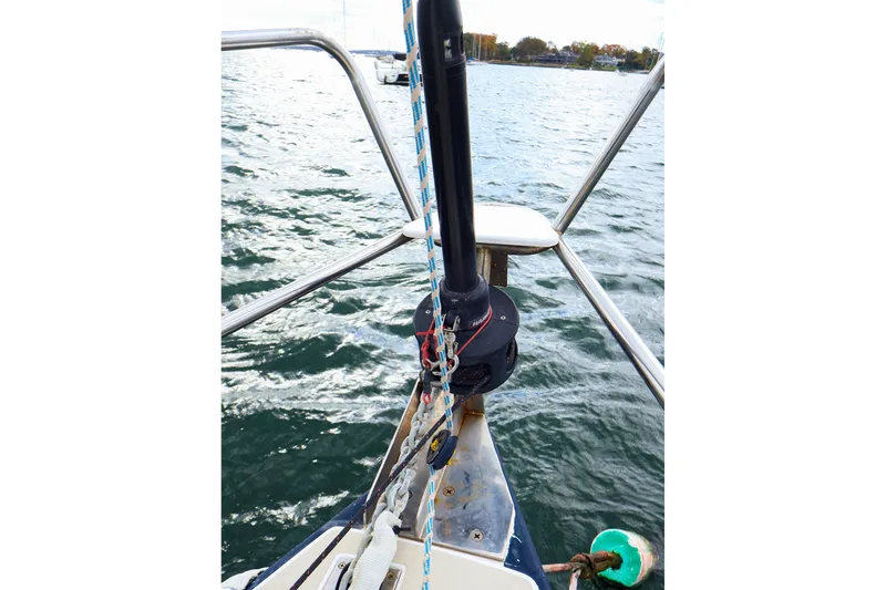 Slide: The Image of Bow view of 1999 J Boats J/32 sailboat on water, featuring rigging and railing. - 7