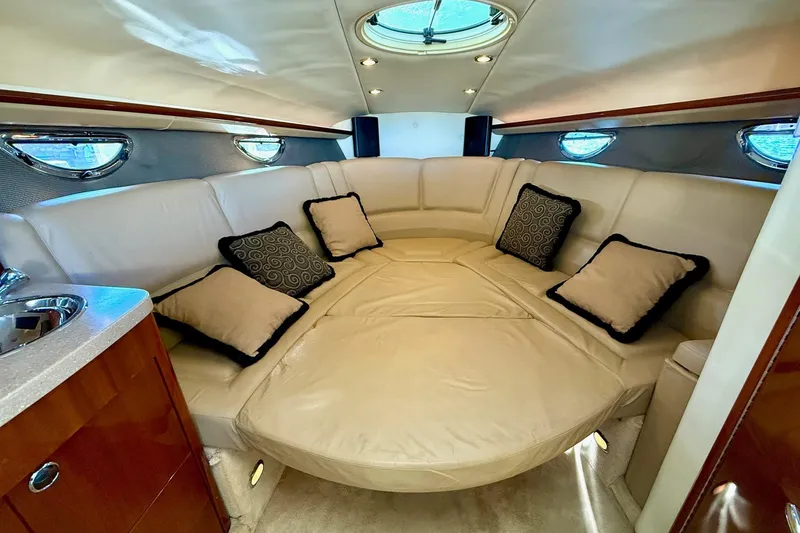 Slide: The Image of Luxurious interior of a 2007 Cobalt 323 boat with plush seating and elegant decor. - 29