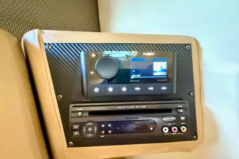 Slide: The Image of Audio system and DVD player in 2007 Cobalt 323 boat interior. - 35