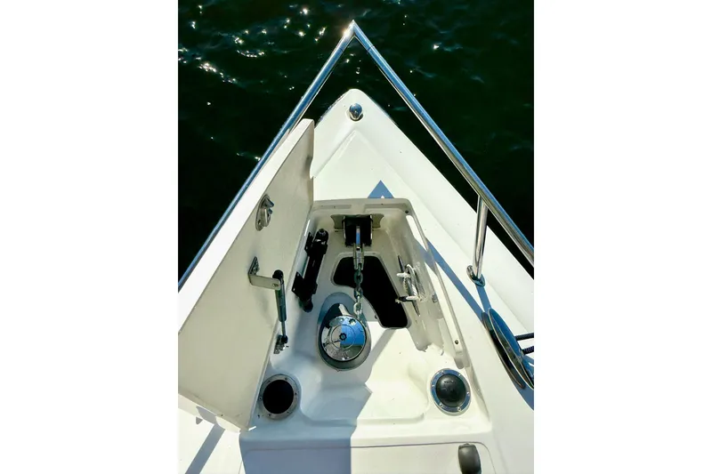 Slide: The Image of Bow of 2007 Cobalt 323 boat with anchor compartment open. - 37