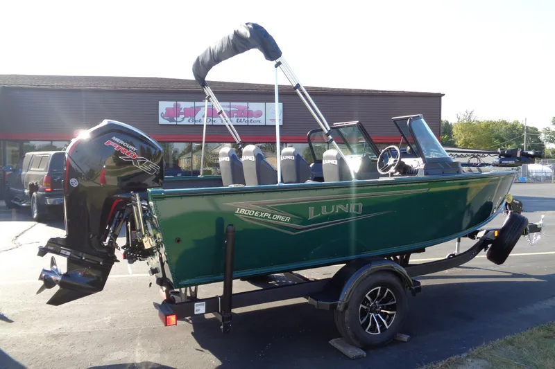 Slide: The Image of 2026 Lund 1800 Explorer Sport boat with Mercury Pro XS engine on trailer. - 4