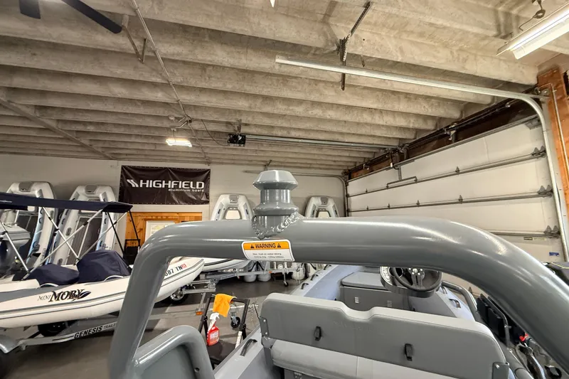 Slide: The Image of Highfield Classic 400 boat in a garage, showcasing interior and equipment, 2026 model. - 11