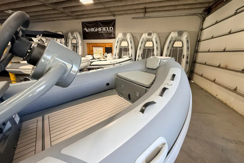 Slide: The Image of Highfield Classic 400 inflatable boat, 2026 model, displayed in a showroom. - 4