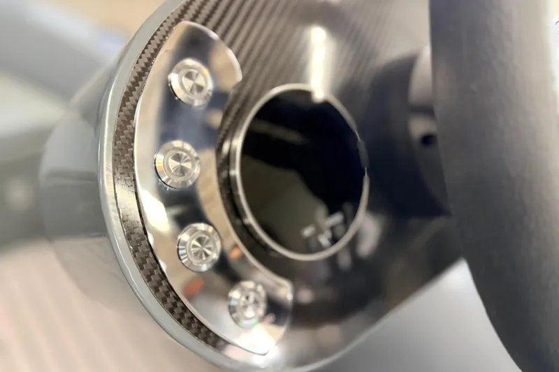 Slide: The Image of Close-up of 2026 Highfield Classic 400 dashboard with carbon fiber and metallic details. - 9