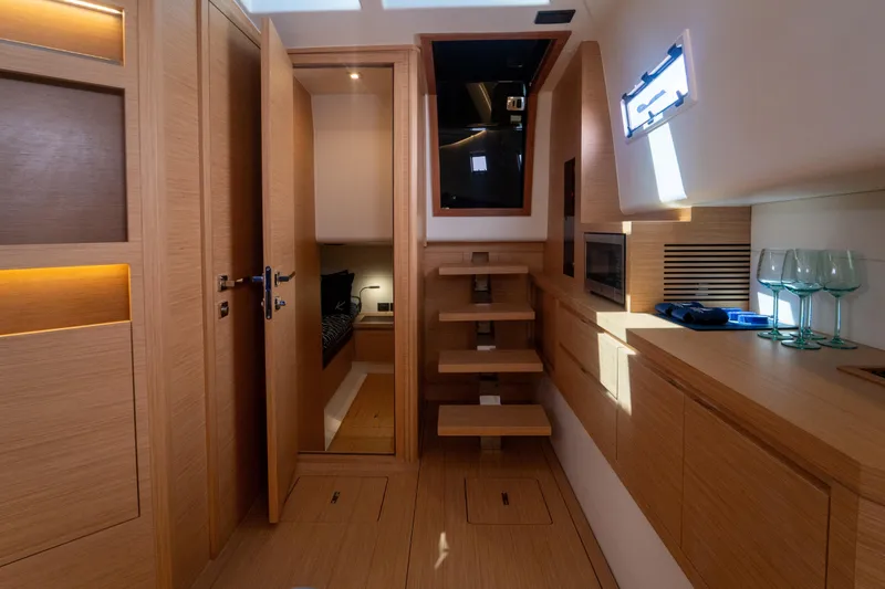 Slide: The Image of Luxurious cabin interior of 2021 Pardo Yachts 43 with ambient lighting and cozy bedding. - 30