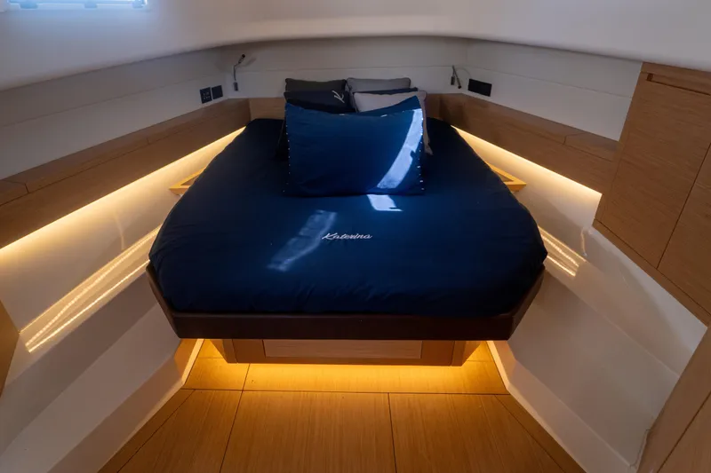Slide: The Image of Interior cabin of 2021 Pardo Yachts 43 with striped bedding and modern design. - 32