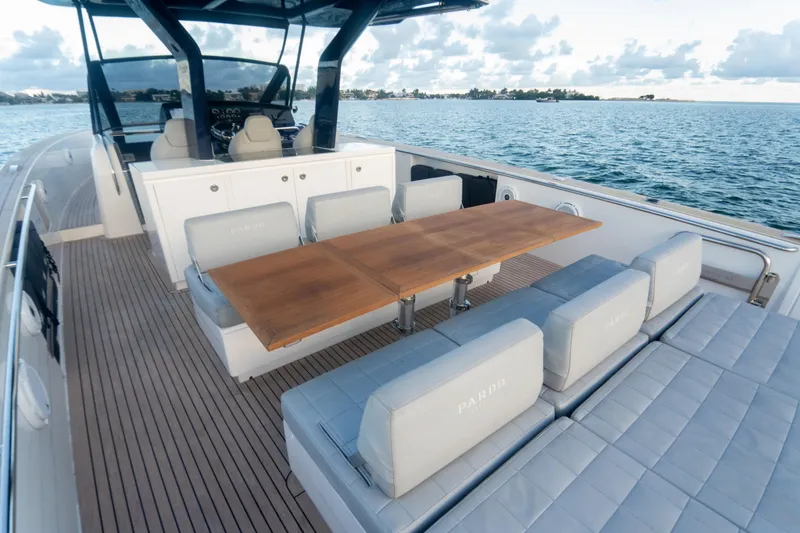 Slide: The Image of Luxury sunbathing area on 2021 Pardo Yachts 43, featuring spacious cushioned deck. - 10