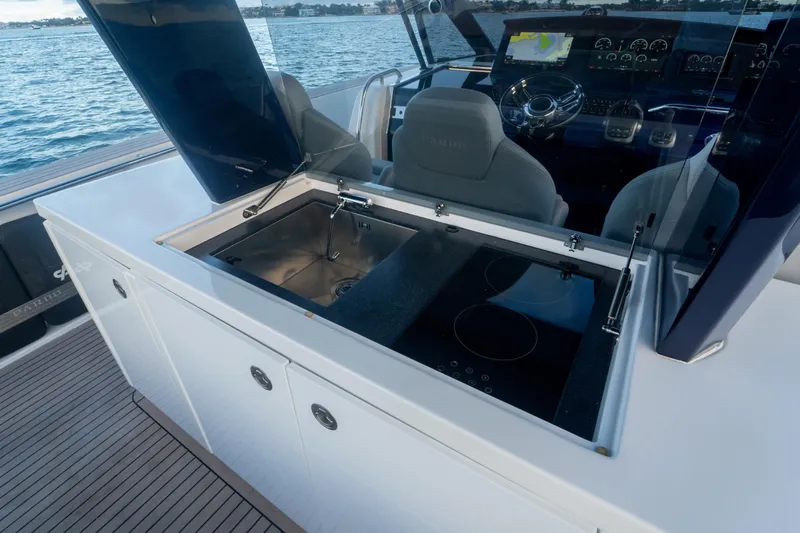 Slide: The Image of Luxurious 2021 Pardo Yachts 43 cockpit with plush seating and ocean view. - 19
