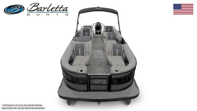 Slide: The Image of 2025 Barletta Lusso L23M pontoon boat, luxury seating, sleek design, American flag. - 5