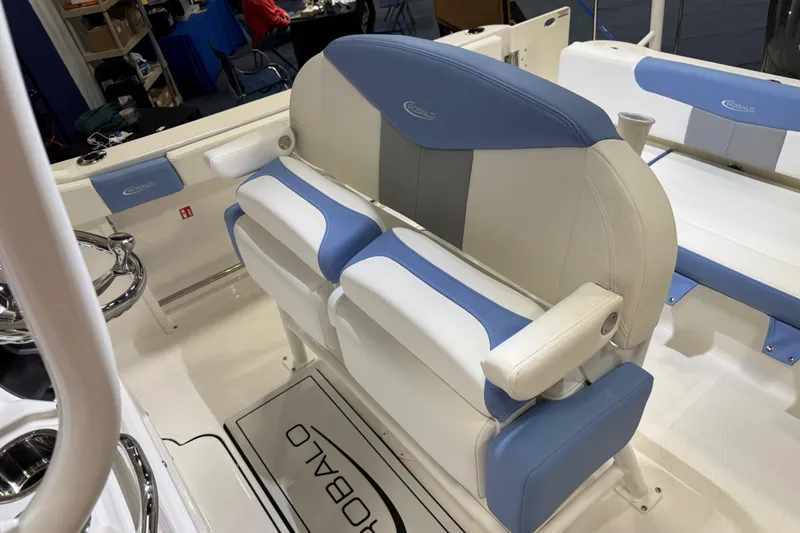 Slide: The Image of Manufacturer Provided Image: 2025 Robalo R222 Explorer boat interior with Yamaha engine, featuring storage and seating. - 22