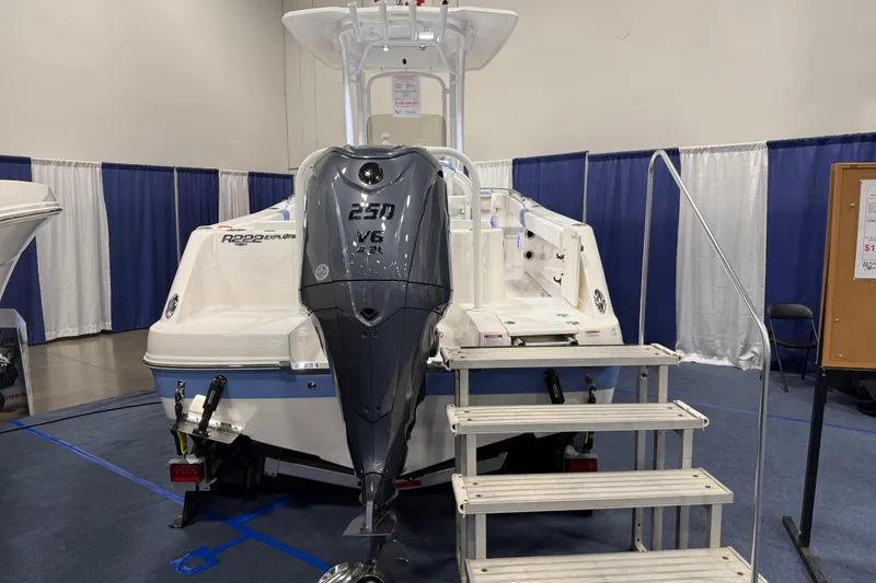 Slide: The Image of Manufacturer Provided Image: 2025 Robalo R222 Explorer boat, rear view with outboard motor, on black background. - 25