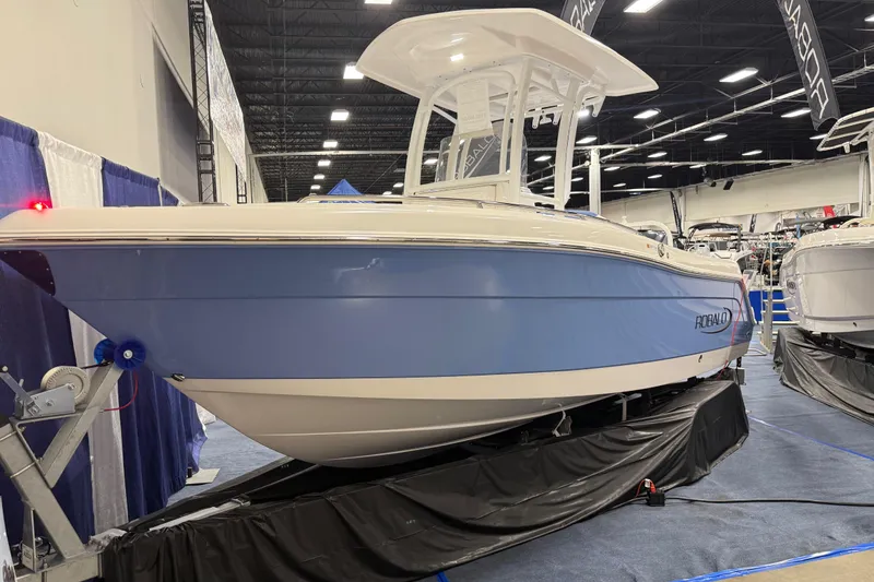 Slide: The Image of Manufacturer Provided Image: 2025 Robalo R222 Explorer boat with outboard motor on black background. - 27