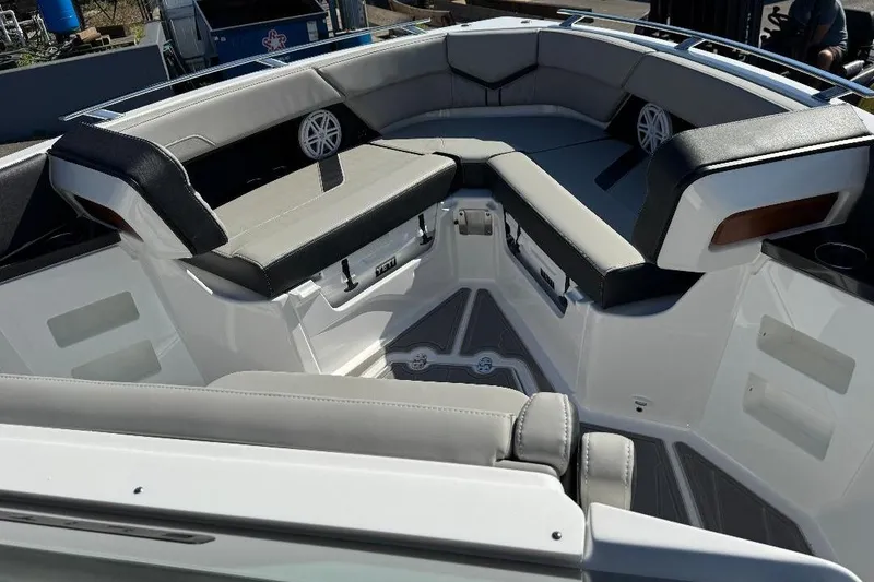 Slide: The Image of 2026 Monterey Elite 30 OB boat interior with luxurious seating and modern design. - 6