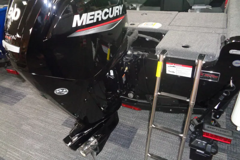 Slide: The Image of 2025 Lund 1675 Adventure Sport boat with Mercury outboard motor and ladder. - 3