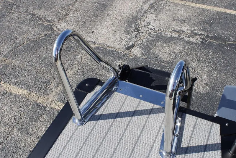 Slide: The Image of Chrome ladder on Avalon Catalina Cruise Rear Bench 25 FT, 2026 model, on textured surface. - 14