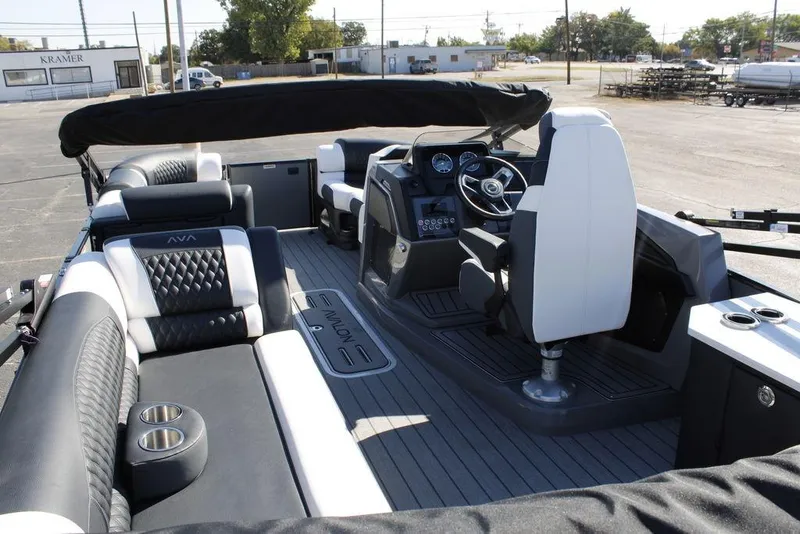 Slide: The Image of 2026 Avalon Catalina Cruise Rear Bench 25 FT interior with luxurious seating and modern dashboard. - 15