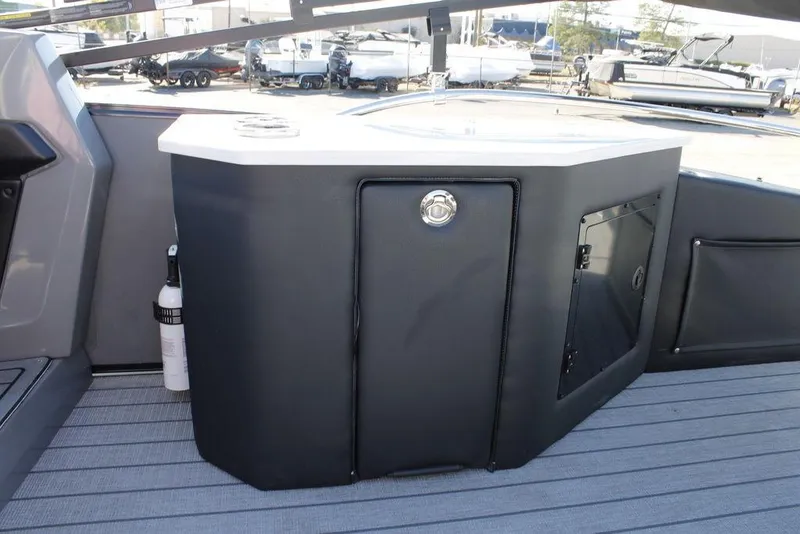 Slide: The Image of 2026 Avalon Catalina Cruise Rear Bench 25 FT boat interior with storage compartment. - 18