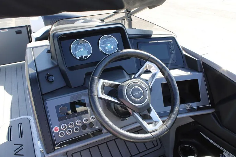 Slide: The Image of 2026 Avalon Catalina Cruise Rear Bench 25 FT dashboard with steering wheel and control panel. - 26