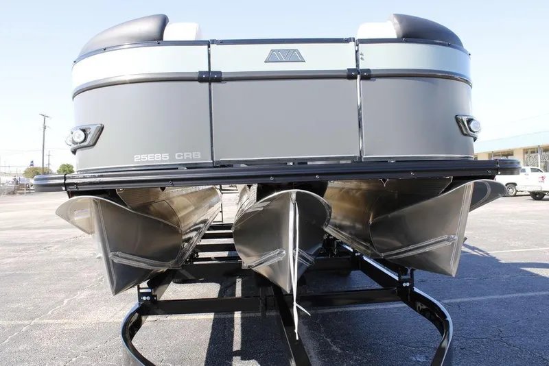 Slide: The Image of 2026 Avalon Catalina Cruise Rear Bench 25 FT pontoon boat, front view on trailer. - 41