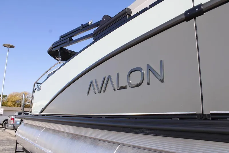 Slide: The Image of 2026 Avalon Catalina Cruise Rear Bench 25 FT pontoon boat, side view with logo. - 42