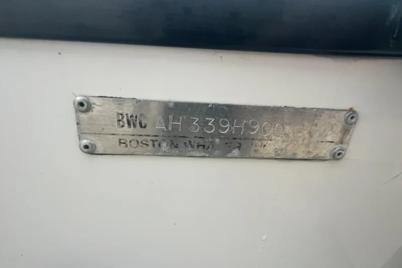 Slide: The Image of Hull identification number on a 2000 Boston Whaler 21 Conquest boat. - 11