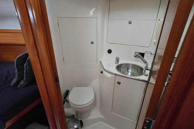 Slide: The Image of Bathroom interior of 1998 Jeanneau Sun Odyssey 42 Center Cockpit yacht. - 26