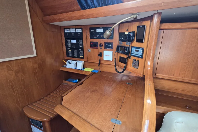 Slide: The Image of 1998 Jeanneau Sun Odyssey 42 on a boatyard stand. - 6