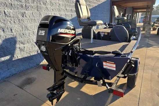 Slide: The Image of 2022 Lowe Skorpion 16 boat with Mercury 25 outboard motor, parked on concrete. - 10