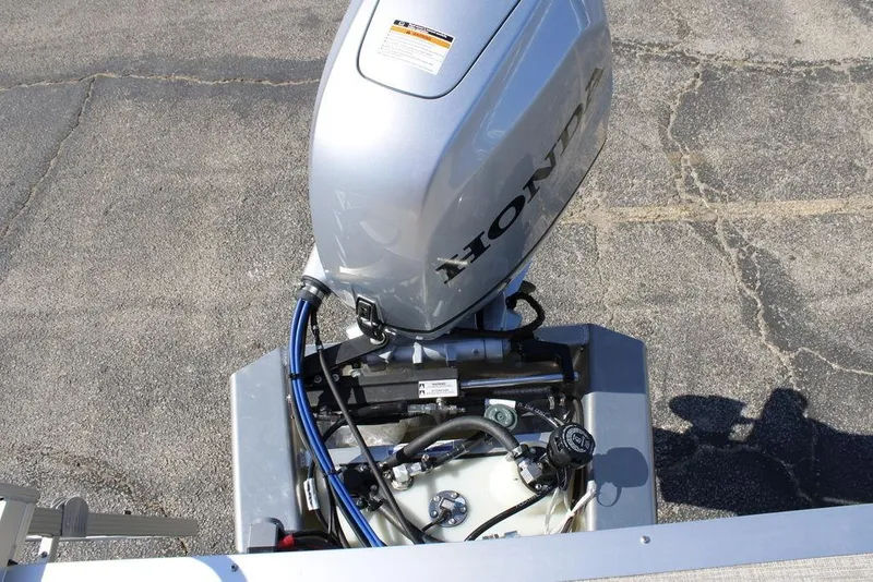 Slide: The Image of Outboard motor on 2026 Avalon AURA QUAD LOUNGER, featuring Honda branding. - 11