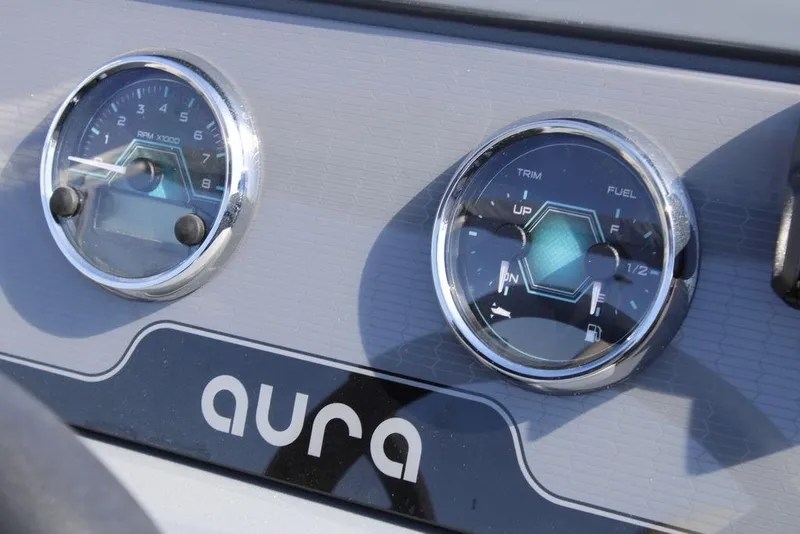 Slide: The Image of Dashboard of 2026 Avalon AURA QUAD LOUNGER with RPM and fuel gauges. - 19