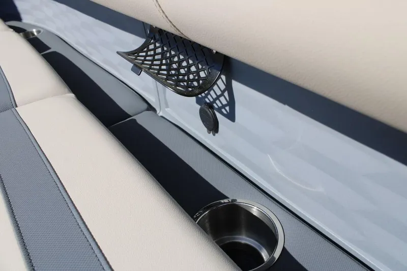 Slide: The Image of Avalon AURA QUAD LOUNGER 2026 interior with cup holder and mesh storage. - 29