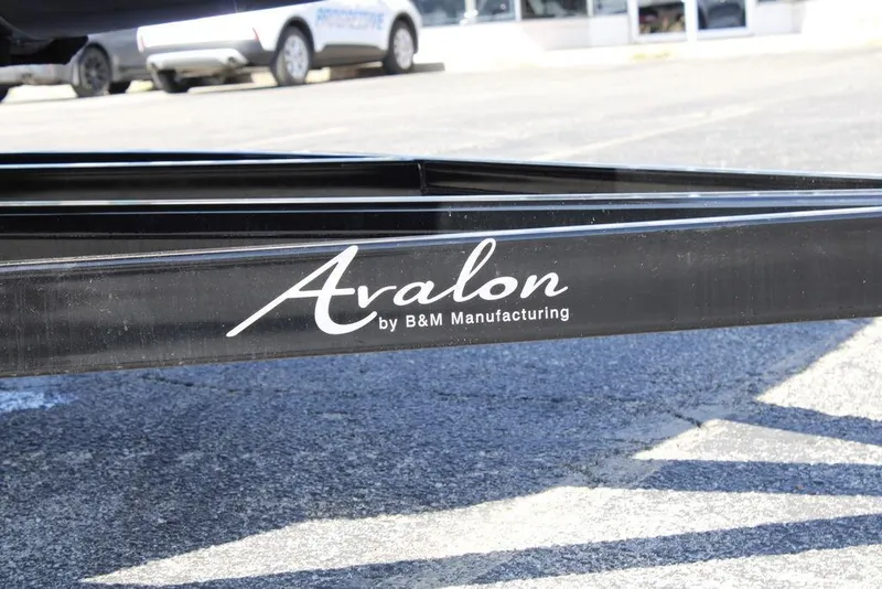 Slide: The Image of Avalon AURA QUAD LOUNGER 2026 frame by B&M Manufacturing on pavement. - 4
