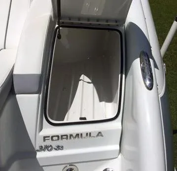 Slide: The Image of Open storage compartment on a 2008 Formula 310 Sun Sport boat. - 18