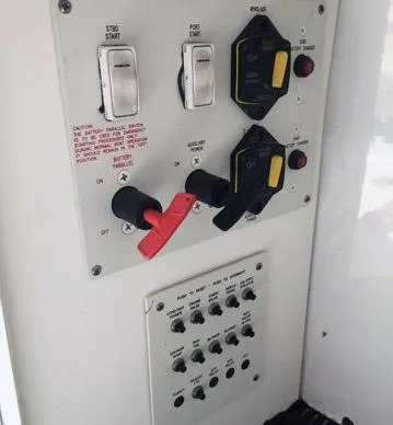 Slide: The Image of Control panel of a 2008 Formula 310 Sun Sport boat with switches and dials. - 23