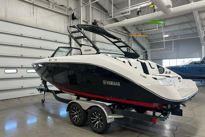 Slide: The Image of 2025 Yamaha Boats 222SE in a showroom, featuring sleek design and modern features. - 3