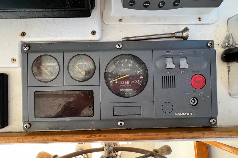 Slide: The Image of Control panel of a 1988 Jarvis Newman Hardtop Cruiser with Yanmar engine gauges. - 5