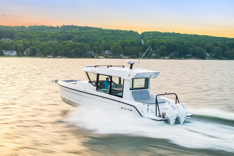 Slide: The Image of 2026 Cruisers Yachts 38 VTR interior with beige seating and table. - 12