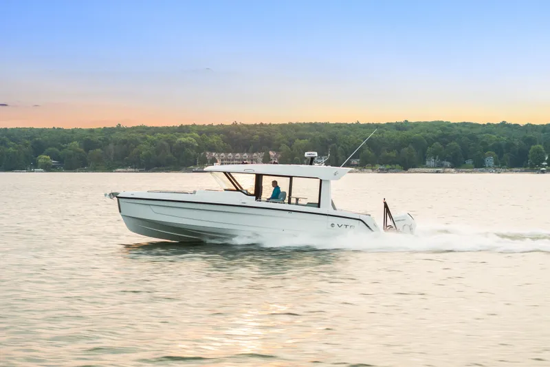 Slide: The Image of 2026 Cruisers Yachts 38 VTR interior at a boat show, showcasing sleek design and modern features. - 19