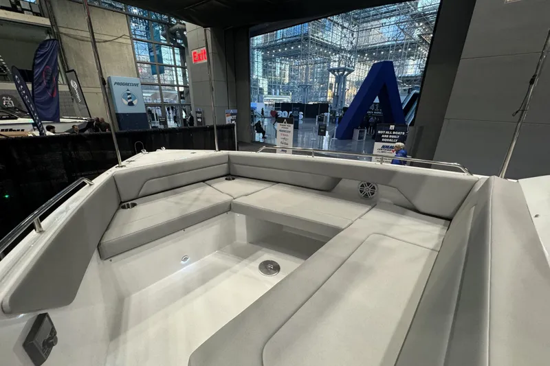 Slide: The Image of 2026 Cruisers Yachts 38 VTR interior with spacious seating at a boat show. - 20