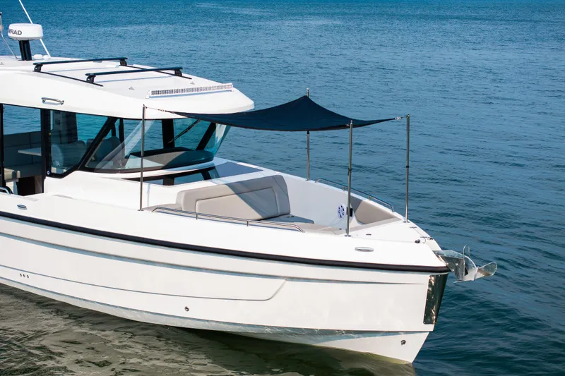 Slide: The Image of 2026 Cruisers Yachts 38 VTR interior with seating, showcased indoors. - 5