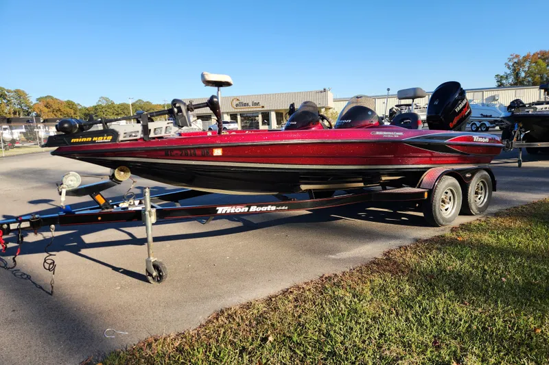Slide: The Image of 2002 Triton Tr-20 ProDeck boat on trailer, parked outdoors, sunny day. - 7