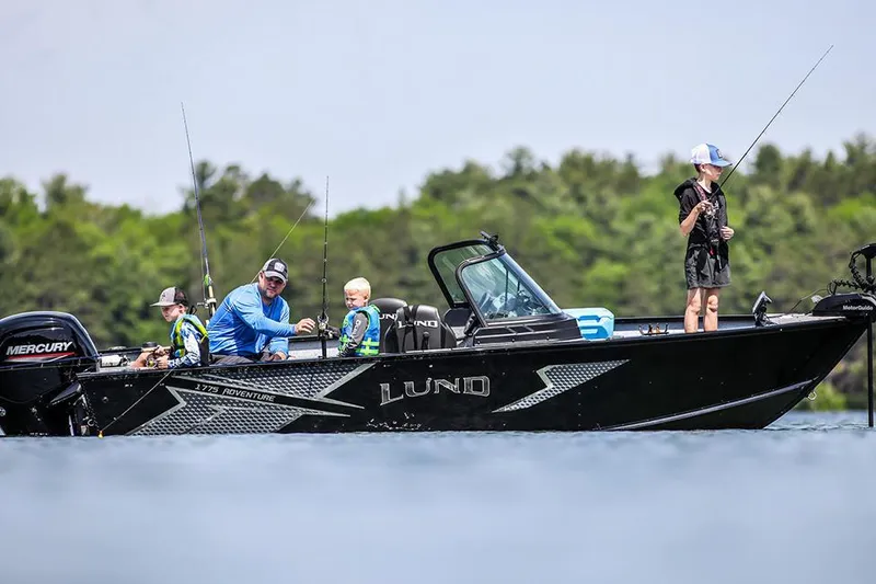 Slide: The Image of Manufacturer Provided Image: 2025 Lund 1775 Adventure Sport boat with family fishing on a lake. - 3