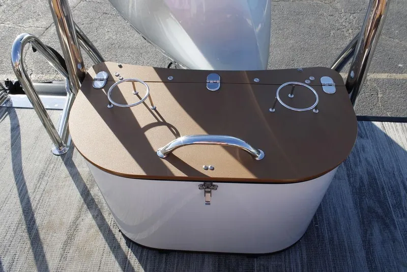 Slide: The Image of 2026 Avalon Catalina Quad Lounger 27 FT boat console with cup holders and handle. - 13