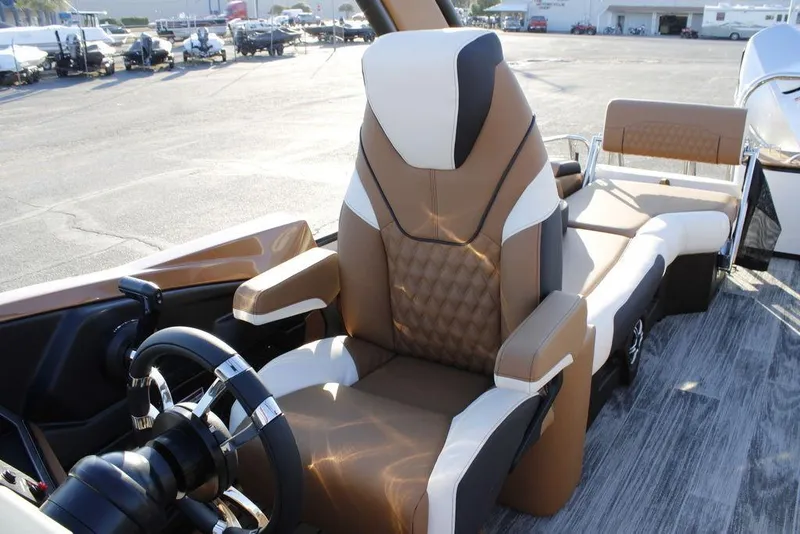 Slide: The Image of Luxurious seating on 2026 Avalon Catalina Quad Lounger 27 FT boat, featuring premium upholstery. - 18