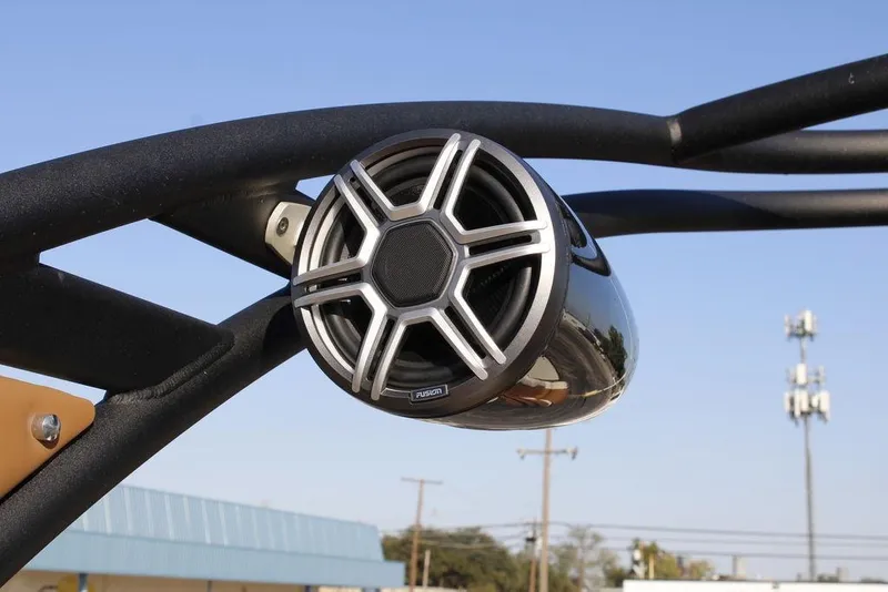 Slide: The Image of Outdoor speaker on Avalon Catalina Quad Lounger 27 FT, 2026 model, under clear blue sky. - 20