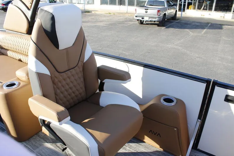 Slide: The Image of Luxurious seating on 2026 Avalon Catalina Quad Lounger 27 FT boat, featuring cup holders. - 22