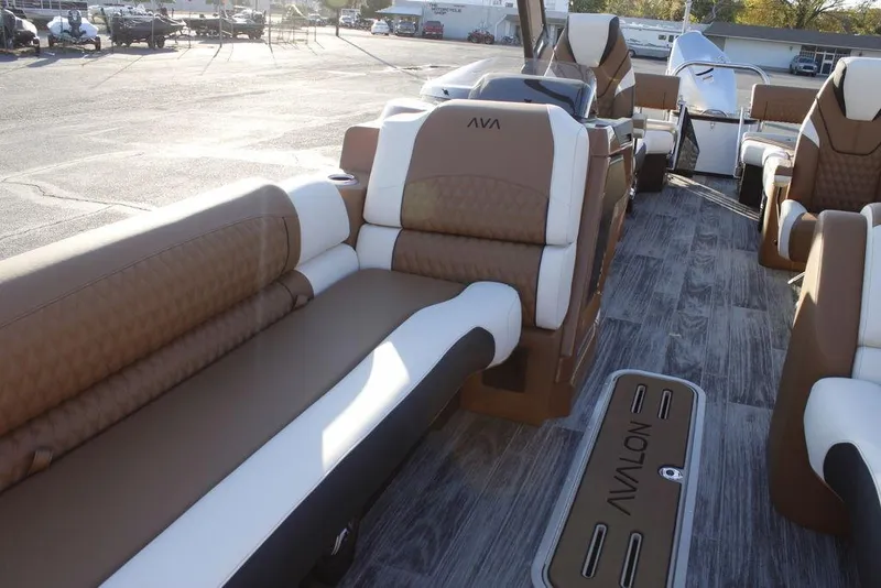 Slide: The Image of 2026 Avalon Catalina Quad Lounger 27 FT with luxurious brown and white seating. - 37