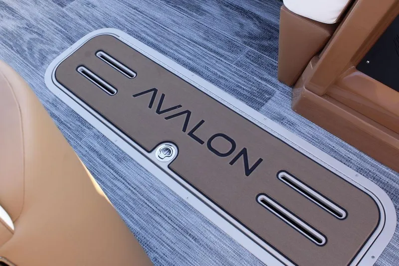 Slide: The Image of 2026 Avalon Catalina Quad Lounger 27 FT boat floor detail with logo. - 39